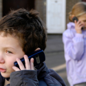 kid using mobile phone